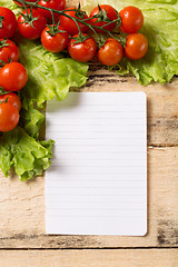 Image showing vegetables and blank paper on wood background