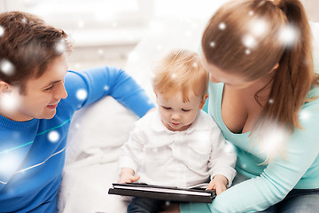 Image showing parents and adorable baby with tablet pc