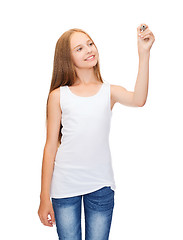 Image showing girl in blank white shirt drawing something