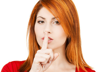 Image showing woman with finger on her lips