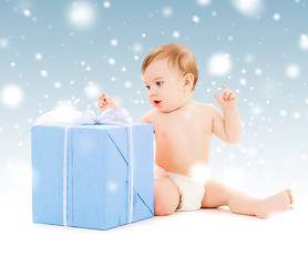 Image showing happy child with gift box