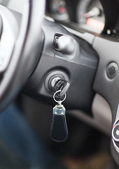 Image showing car key in ignition start lock