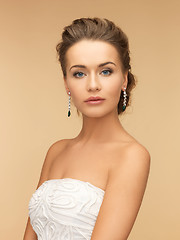 Image showing woman wearing shiny diamond earrings