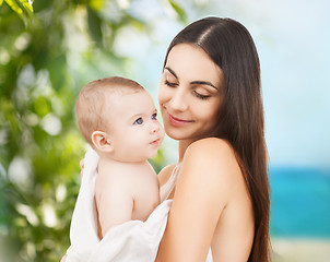 Image showing happy mother with adorable baby