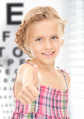 Image showing girl with optical eye chart