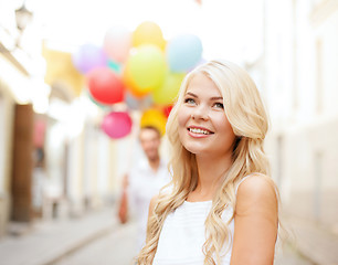 Image showing couple with colorful balloons