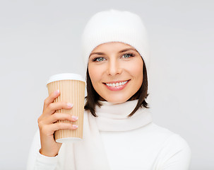 Image showing woman in hat with takeaway tea or coffee cup