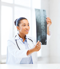 Image showing african doctor looking at x-ray