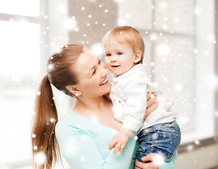 Image showing happy mother with adorable baby