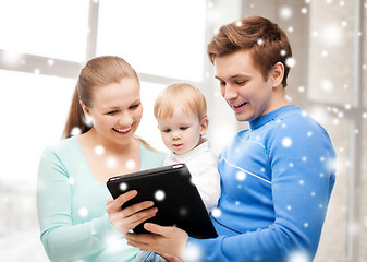 Image showing parents and adorable baby with tablet pc