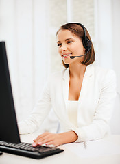 Image showing friendly female helpline operator