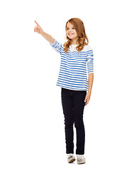 Image showing girl pointing at imaginary screen