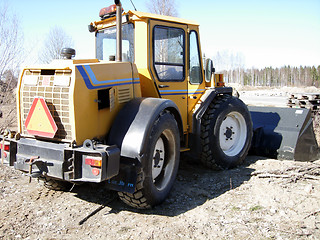 Image showing A yellow tractor