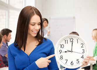 Image showing student showing clock