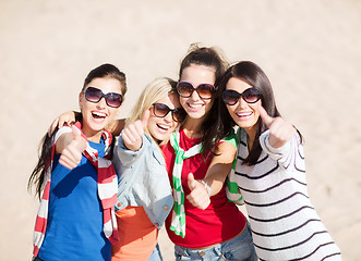 Image showing teenage girls or young women showing thumbs up