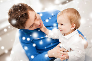 Image showing happy father with adorable baby