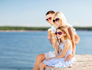 Image showing happy family eating ice cream