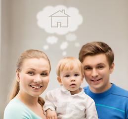 Image showing family with child dreaming about house