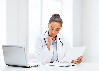 Image showing female doctor with laptop pc