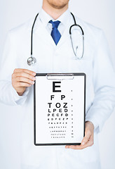 Image showing male ophthalmologist with eye chart