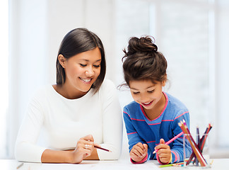 Image showing mother and daughter drawing