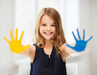 Image showing girl showing painted hands