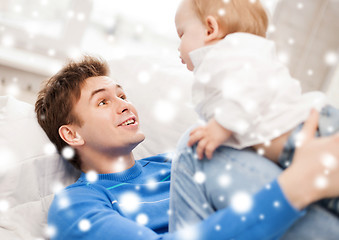 Image showing happy father with adorable baby