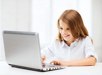 Image showing girl with laptop pc at school