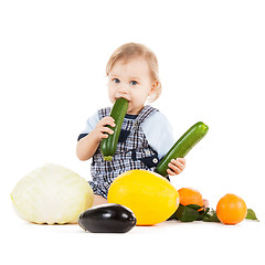 Image showing toddler eating squash