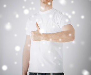 Image showing man showing thumbs up