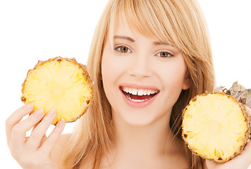 Image showing happy girl with pineapple