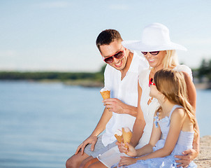 Image showing happy family eating ice cream