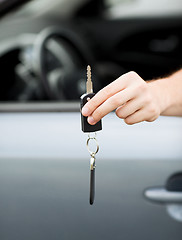 Image showing man with car key outside