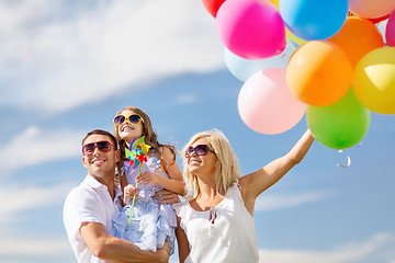 Image showing family with colorful balloons