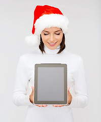 Image showing woman in santa helper hat with tablet pc