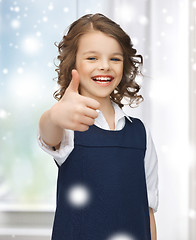 Image showing pre-teen girl showing thumbs up