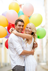 Image showing couple with colorful balloons