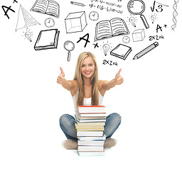 Image showing student with stack of books