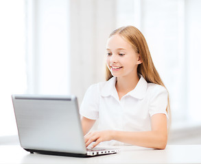 Image showing girl with laptop pc at school