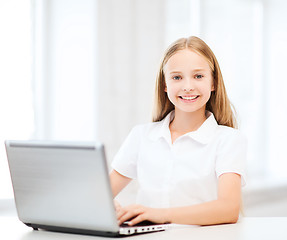 Image showing girl with laptop pc at school