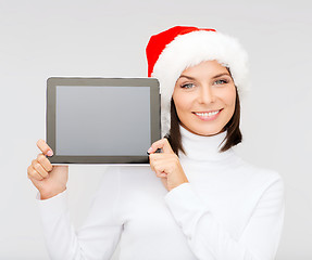 Image showing woman in santa helper hat with tablet pc