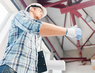 Image showing man with blueprint