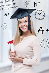 Image showing student in graduation cap with certificate