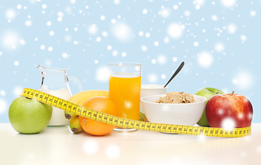 Image showing healthy breakfast and measuring tape