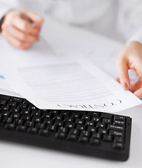 Image showing woman hand signing contract paper