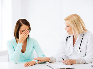 Image showing doctor with patient in hospital