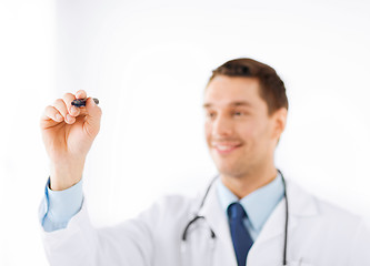 Image showing doctor writing something in the air