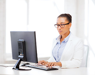 Image showing african businesswoman with computer in office