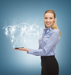 Image showing businesswoman with smartphone and virtual screen