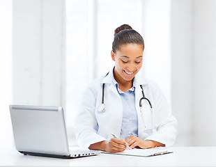 Image showing female doctor with laptop pc